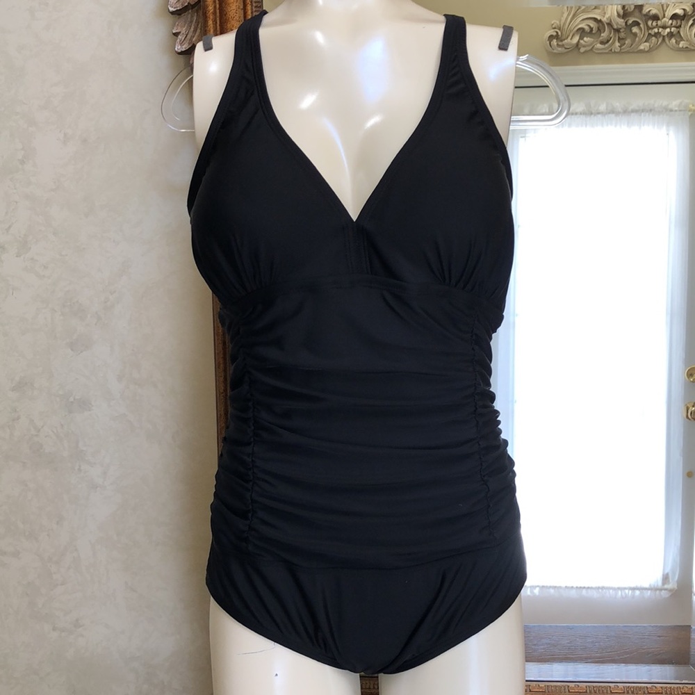 New women’s one piece black swimsuit.  Size L.  By Shely. Tummy control. Ruched.